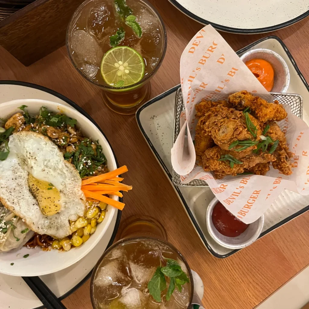 a table served with food at devils burger assam